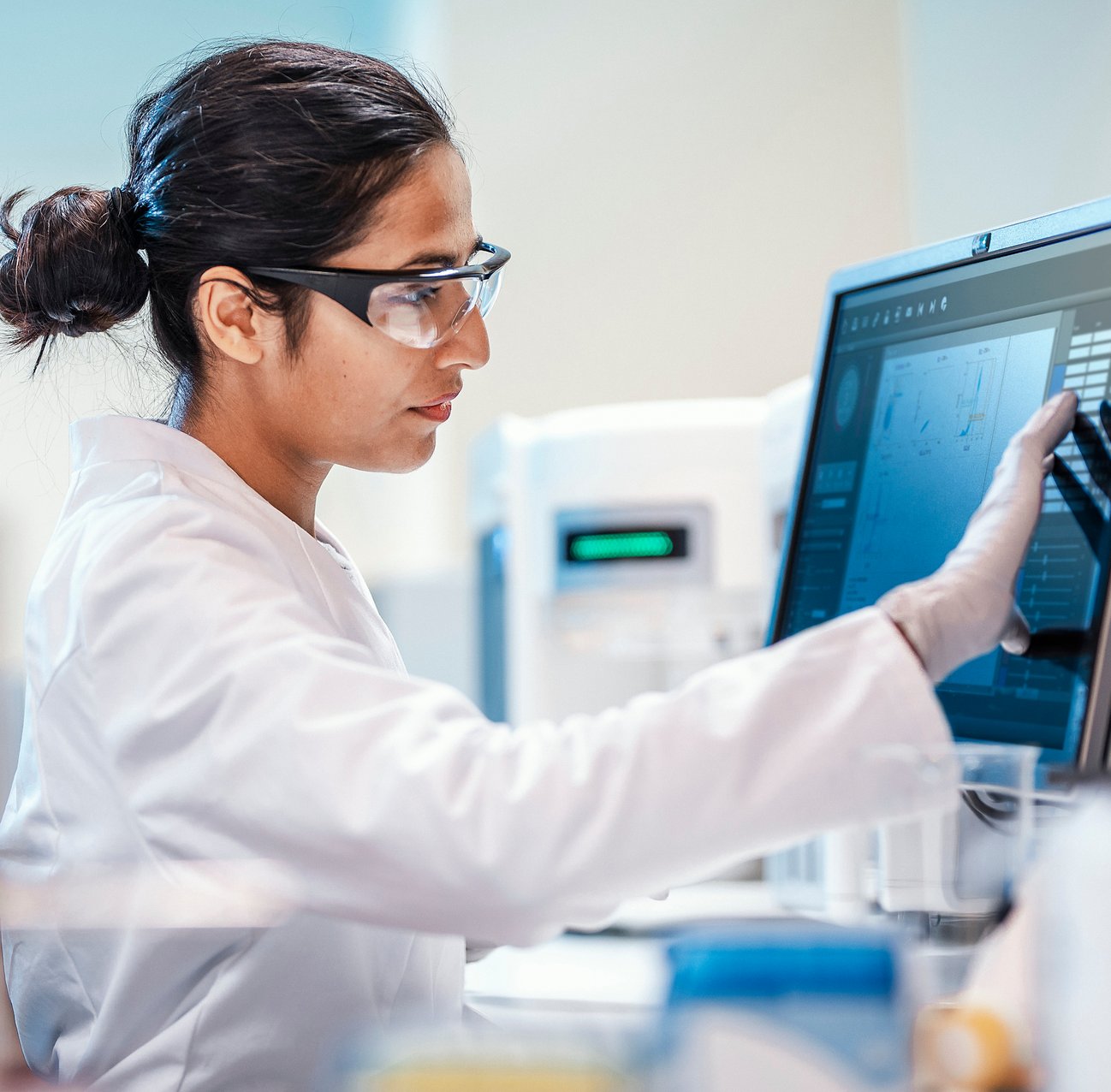 CDMO technician executing a diagnostic test