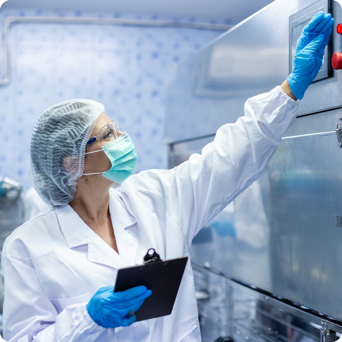 Life Sciences technician reviewing operations data
